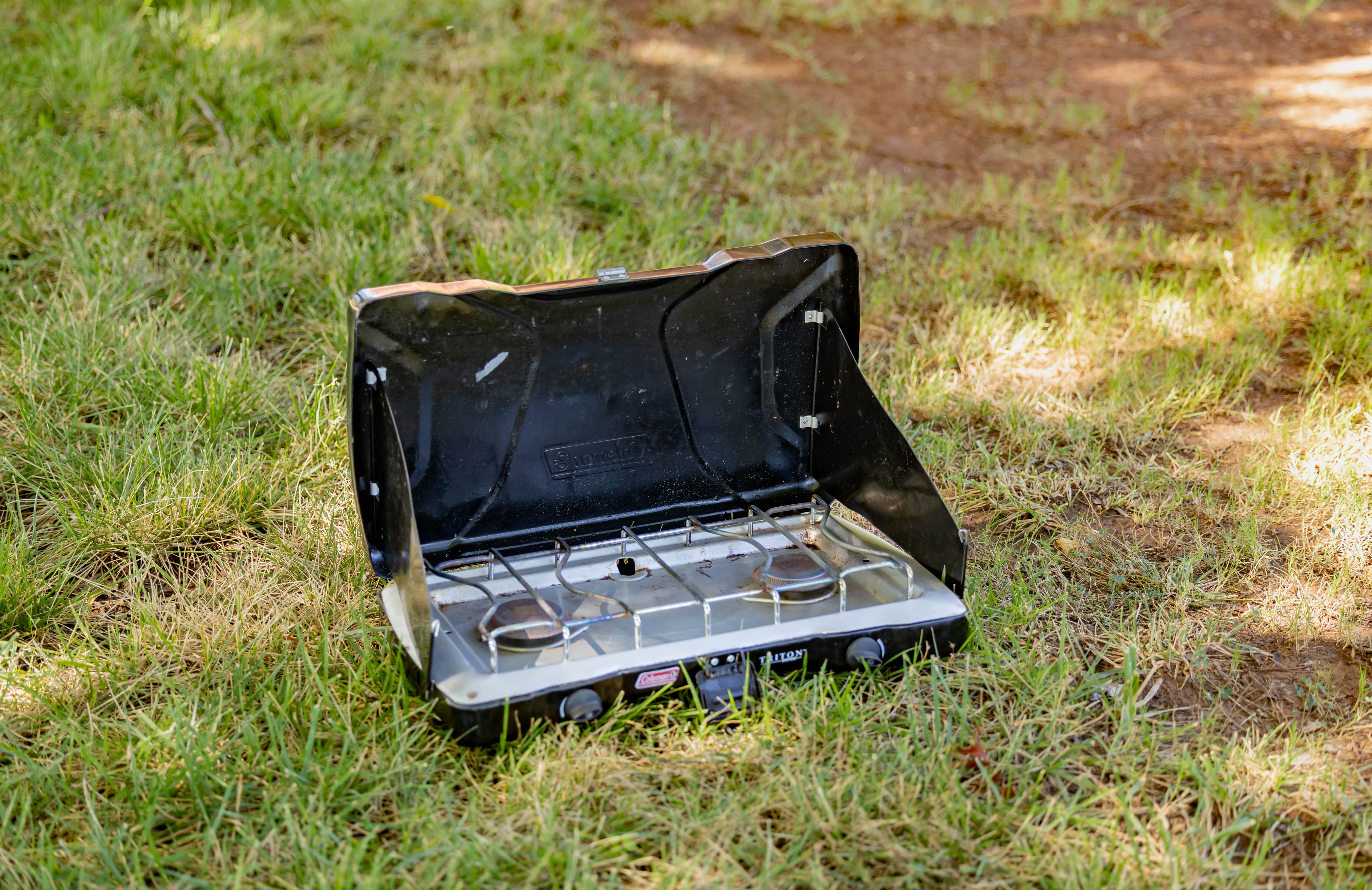 A decorative image of one of the camping stoves available for rent. 