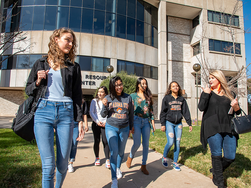 Students walking outside Students walking outside
