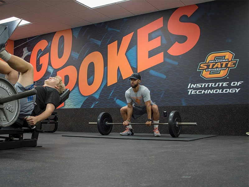 Students using gym Students using gym